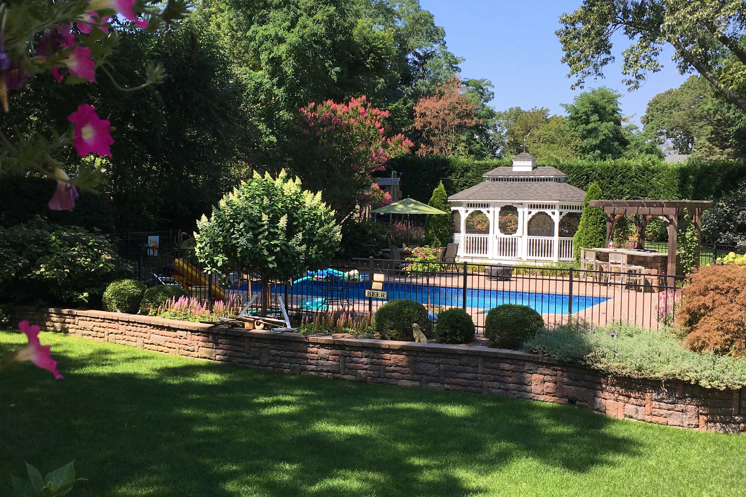 Poll gazebo and retaining wall